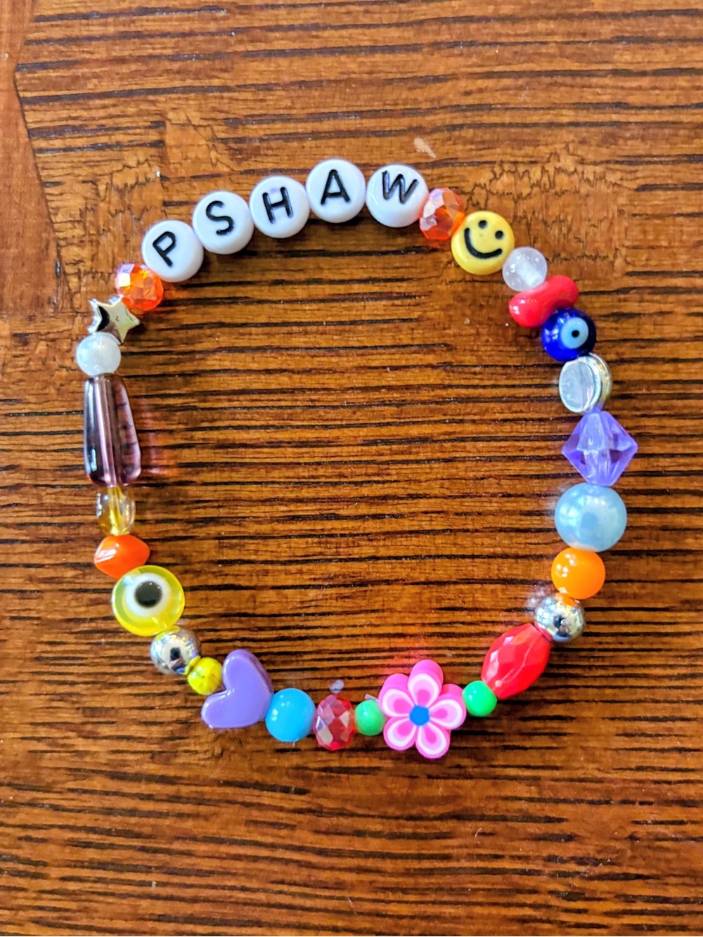 Handmade Beaded Bracelet in Multicolor - “PSHAW” Lettering